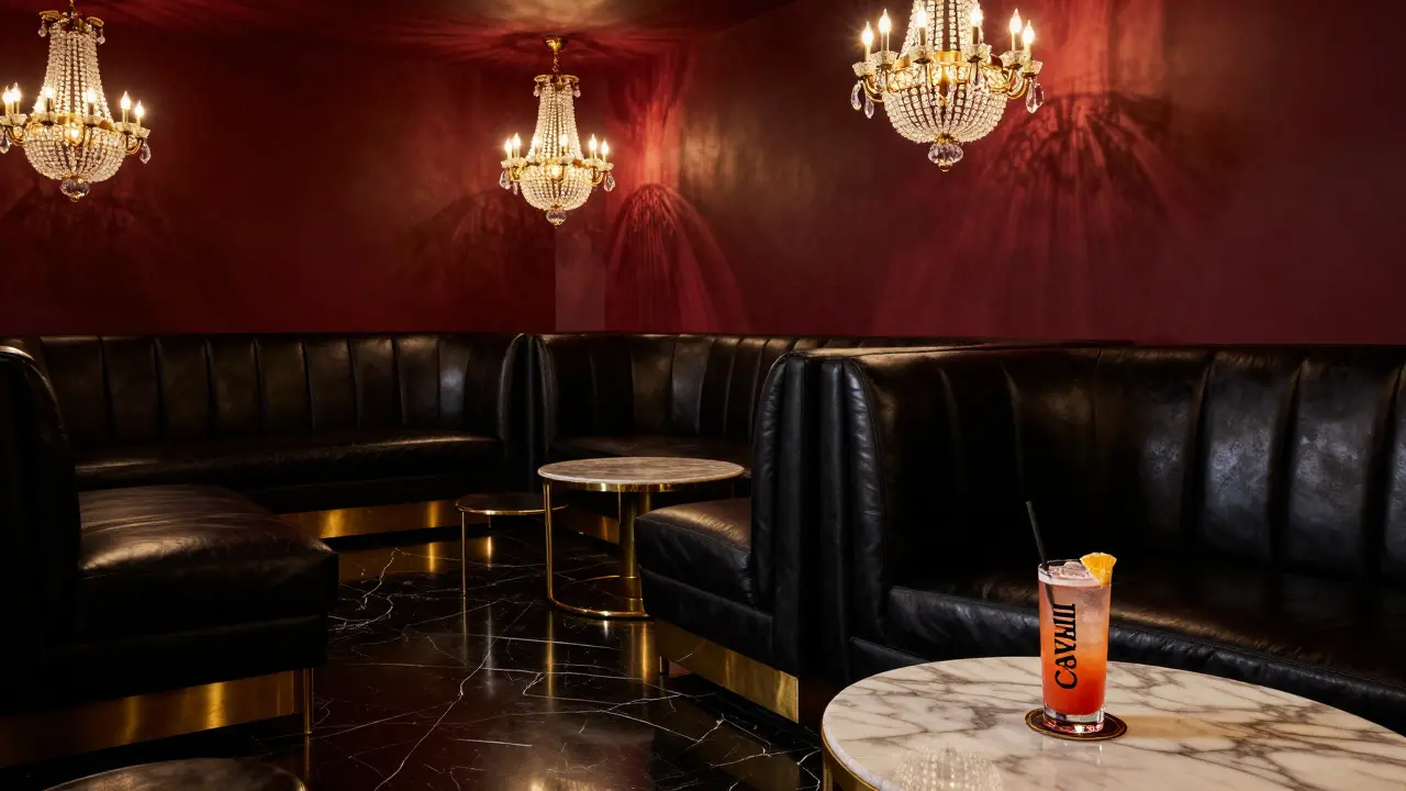VIP lounge with plush seating, gold accents, and crystal chandeliers inside Cavalli Club.